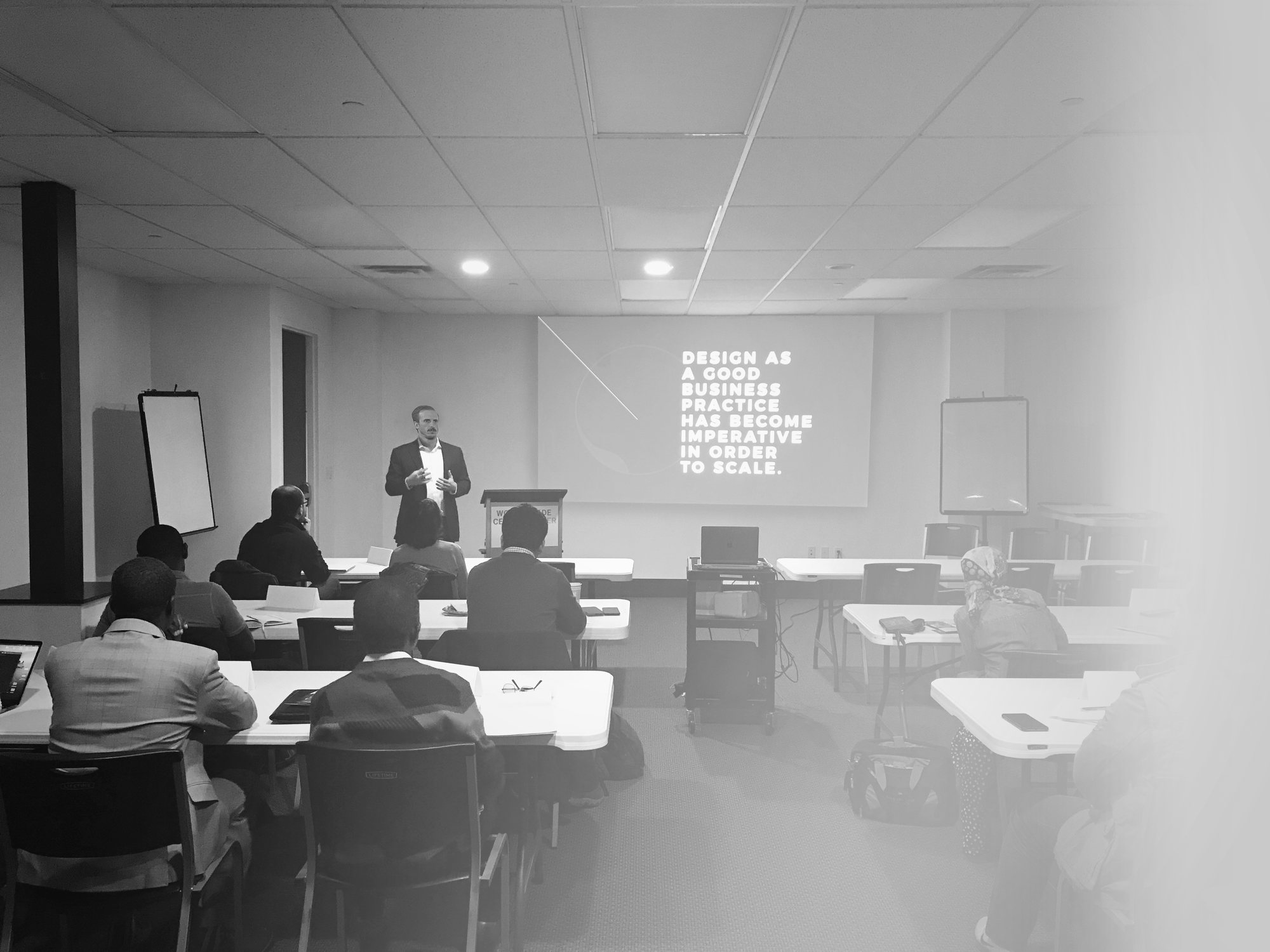Martin speaking at a design event