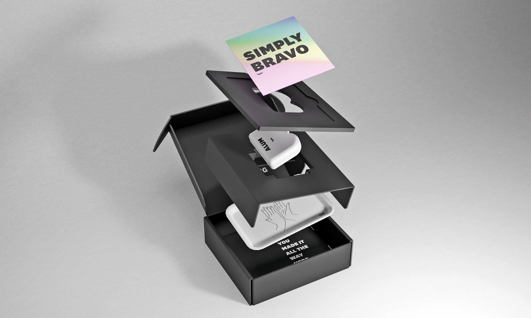 Flat lay of byte bottles, tongue scraper, and floss on white